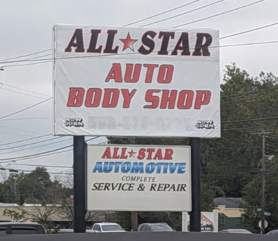 The All Star Auto Body Shop sign on Hixie Highway in Louisville